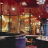 Red gloss painted ceilings in the bar