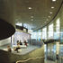 Looking up the ramp from the main entrance, the auditorium is behind the wall to the left