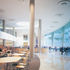 The hub facing the landscape has a choice of serveries.  The higher level walkway to the left connects to the office blocks