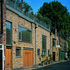 Re-fenestration, with neighbouring house beyond still in black, 1983 style
