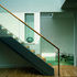 The new stair in the living room, with plane standing on glass room to study below