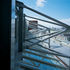 The tubular steel framework supports the restaurant while allowing sunlight into the gallery