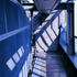 The lift shaft is designed in steel with a glass and wire mesh infill