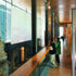 The first floor balcony provides full-height gallery views