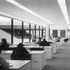 Open plan offices extend the whole depth of hte head office building