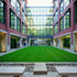 The buildings frame a series of public spaces which open up the site