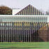 Cafeteria projects from and wraps around the main frame of the building
