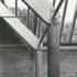Tall concrete columns become like objects in the collection