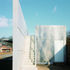 The southern elevation- external staircases at either end of the building give access to the rooftop walkway