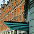 A canopy marks the new reception area- previously the grand hotel entrance was significant by its absence