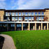 The ground floor of each of the office blocks is formed as a colonnade of square brick piers