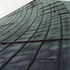 The orginal roof held in place by poles tied through to the inside