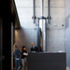 The small lobby is transformed by the vertical movement of the moving room 