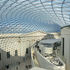 The lightweight ethereal roof floats over the Great Court