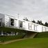 The rigid structure of the barn makes the cantilever possible, viewed from the lawn
