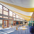 The roof to the café/waiting area opens up to the south,  allowing light to penetrate deep into the interior