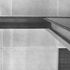 Relationship of the module of the acoustic-tile ceiling to the lighting troughs and a standard partition (the narrow tiles are the same dimension as the thickness of a partition)