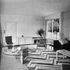 The living room occupies the end of the long wing