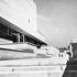 Looking up the external stairs that follow the slope of the ground along the flank of the assembly hall