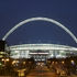 Stadium and arch at night