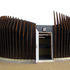 Side view towards staff entrance, showing sculptural effect of weathering steel fins