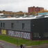 The horizontal emphasis of the facade has been retained