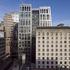 Double-height ordering of the facade helps to reduce perceived scale