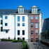 The Sculpture Court elevation adopts the proportions of the listed facade