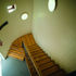 Carefully crafted rear stairs leading down from the first-floor offices
