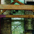 A cast-glass stair screen, illuminated from above by natural light and below by uplighters