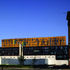 The building’s facade features giant silk-screened lettering, spelling out the names of the region’s canals