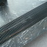 Reading Room perimeter heating detail in matching black marble