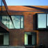 A staggered window layout is brought to the elevations