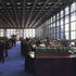 Contrasting elements; black ceilings, obscured glass walls and blue carpet 