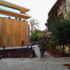 The west facade tilts away from The Grove