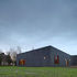 Elevations are marked out by rigorously set-out slate coloured Marley Eternit cladding panels