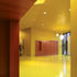 Bright yellow walls and matching Dalsouple rubber floors