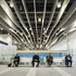 Passengers sit underneath the undulating baffles