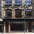 A glazed frontage creates a large street-level vitrine