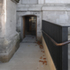 York stone paving runs uninterrupted from the street to the crypt