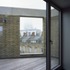 The upper-level apartments feature roof terraces