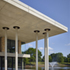 The first-floor deck extends in a deep cantilever over the approach to the student centre