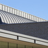 The external barrel vault is clad in pre-weathered zinc