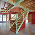 The staircase rises diagonally through the reception area