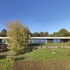 The house sits on a gentle slope