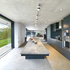 Kitchen, dining and living spaces lie to the east of the large inset court