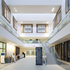 Offices are arranged around a triple-height atrium