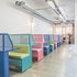 A line of booth-like desks