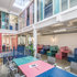The pastel hues suggest Art Deco Miami