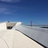 A curved ramp wraps around the building